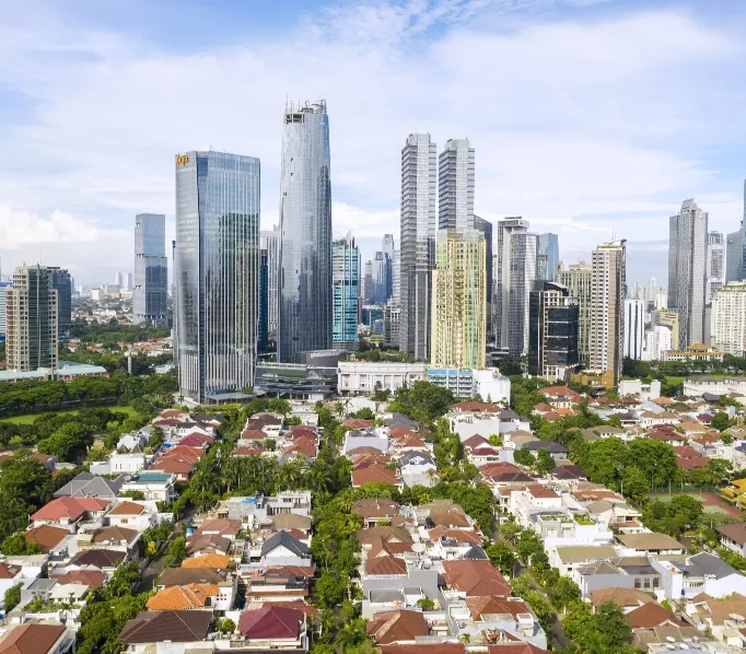 dense-residential-with-skyscrapers-blue-sky Empowering Real Estate Business To Achieve Sustainable Growth